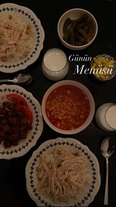 a table topped with plates of food and bowls of soup next to utensils