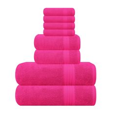 five towels stacked on top of each other in bright pink colors, one folded and the other rolled up