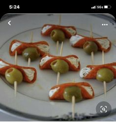 small appetizers with olives and cheese on toothpicks