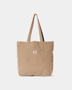 Color: Peanut - The Bayfield Tote is made from 12 oz Dearborn Canvas, which is a robust organic cotton fabric that will soften with wear over time. It has also undergone a 'faded' treatment, leaving it with a washed yet saturated appearance and rendering the woven Square Label murky in the process. The bag fastens with a snap-button closure and features a pocket on the outside, as well as a zipped pocket on the inside. _* 100% Organic Cotton 'Dearborn' Canvas, 12 oz, 40 x 38 x 13 cm / 15.7 x 15 Clarks Wallabees, Carhartt Work In Progress, Vans Off The Wall, Nudie Jeans, Clarks Originals, Organic Cotton Fabric, Carhartt Wip, Pocket Square, Family Shirts