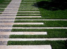 the steps are lined with grass and stones