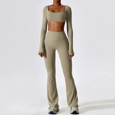 Transform Your Workout Experience Empower your fitness journey with our Women's 2-Piece Yoga Tracksuit, designed specifically to enhance your workout regime. Crafted with a blend of 78% nylon and 22% spandex, this sportswear set combines style, comfort, and performance. Ideal for a range of activities from yoga to intense gym sessions, the tracksuit features a sleek long sleeve crop top paired with high-waist leggings that offer a snug, flexible fit for all body types. Product Features Fabric Co Solid Color Activewear With Thumbholes For Pilates, Solid Activewear With Thumbholes For Pilates, Pilates Activewear With Thumbholes, Fitted Solid Activewear, Sweat Resistant, Breathable High-stretch Activewear For Loungewear, Fitted Activewear With Thumbholes For Light Exercise, Solid Fitted Activewear For Loungewear, Fitted Seamless Yoga Pants For Workout, Fitted Full Length Sportswear Activewear