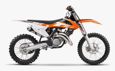 an orange and white dirt bike on a white background