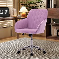 a purple office chair sitting on top of a rug