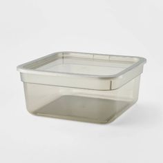 a plastic container with a lid on a white background