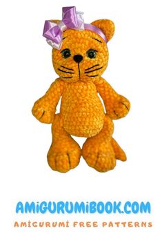 an orange teddy bear with a purple bow on it's head and the words amigurum book com