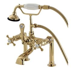 the bathtub faucet is gold and has two handset spouts