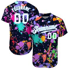 a baseball jersey with paint splattered all over it