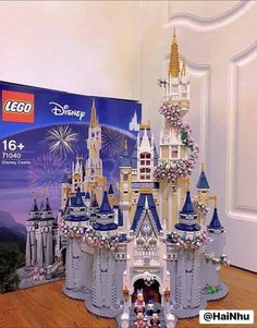 a large lego castle with fireworks in the background