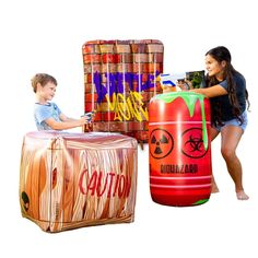 two children are playing with an inflatable barrel