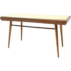 a wooden table with two legs and a white surface on the top, against a white background