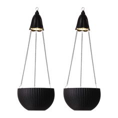 two black hanging baskets with chains attached to them