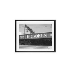 a black and white photo of the hoboken sign