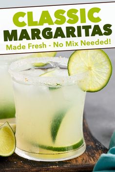 a close up of a drink with limes on the rim and text that reads classic margaritas made fresh - no mix needed