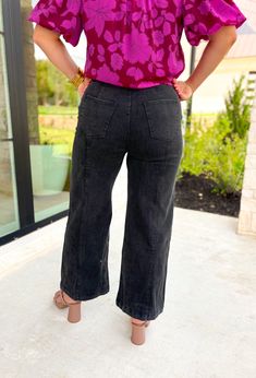 Elevate your wardrobe with our Bridget Wide Leg Pants in Black! Featuring a flattering wide leg design and intricate braided detailing along the waist, these timeless jeans add a touch of bohemian charm to any outfit. By Entro Model is 5'4 wearing a medium Fits true to size 97% cotton, 3% spandex