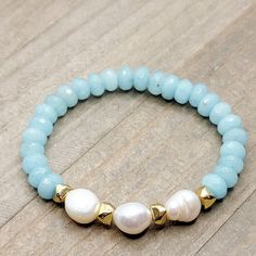 This gemstone bracelet says glam and class all in one.  You can wear it independently, or mixed and matched with other complimenting pieces!  Faceted Amazonite gemstones Fresh water baroque pearls Brass beads Fit's most wrists  Made in studio - Wilmington, NC Amazonite Jewelry, Brass Beads, Bracelet Design, Wilmington Nc, Green Opal, Unique Bracelets, Diy Stuff, Beaded Jewelry Diy, Jewelry Diy