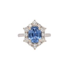 Stunning is an understatement for this ring! The all-natural diamond halo and accents perfectly emphasize the blue in this sapphire from Ceylon. The halo design gives a slightly vintage feel but in the most elegant way. This ring is now ready to ship in white gold, but can be recast to yellow or rose gold! This ring can also be a beautiful September birthstone gift for your loved ones! This ring is made with solid 14K Gold and naturally Earth-mined SI / G-H diamonds. As listed, this ring is read Designer Silver Jewellery, Halo Design, Blue Sapphire Ring, Jewelry Showcases, Ring With Diamond, Birthstone Gifts, September Birthstone, Blue Sapphire Rings, Earring Findings