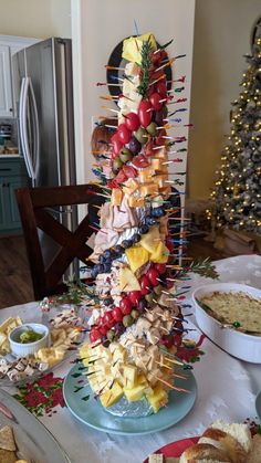 a christmas tree made out of food on a table