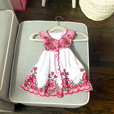 Stunning Linen Dress For A Beautiful Baby Girl. It’s Hand Crafted And Never Worn Once. I Got Two Dresses From A Boutique And This One Was Never Worn For Her First Birthday. It’s More Stunning In Person. Perfect For Summer Or Warm Days . I Would Recommend This For A One Year Old Baby Girl. Floral Embroidered Summer Dress For Playtime, Summer Floral Embroidered Playtime Dress, Summer Floral Embroidery Dresses For Playtime, Playful White Embroidered Dress, White Embroidered Dress For Holidays, White Embroidered Holiday Dress, White Summer Twirl Dress For Playtime, White Twirl Dress For Summer Playtime, White Summer Twirl Dress For Dress-up