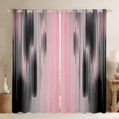 the curtains in this room are pink and black