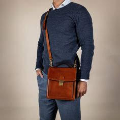 A perfect companion for the modern man. A small full-grain leather briefcase with a classic, timeless look and a sturdy frame for those who like to keep it light and leave the home office at home. But since you cannot fit your wallet, smartphone, keys, and now a tablet in the pockets of your pants, this is the bag that will accommodate those essentials that you can't leave home without. This small and compact bag has the look of a classic business briefcase combined with the ease of carrying a messenger bag. Features * Tablet sized - fits iPad Mini, Kindle, and Nook. All at once if you wish; * Carry handle with pleasant grip for easy carrying in hand; * Detachable shoulder strap; * Two main compartments and additional pockets outside and inside; * An outside zip pocket right at your side; Luxury Briefcase With Top Carry Handle, Business Crossbody Briefcase With Leather Lining, Leather Lining Crossbody Briefcase For Business, Leather Lined Crossbody Briefcase For Business, Business Shoulder Bag With Bridle Leather And Leather Lining, Classic Rectangular Briefcase For Everyday Use, Classic Formal Briefcase With Top Carry Handle, Everyday Bridle Leather Rectangular Briefcase, Business Crossbody Satchel With Smooth Grain