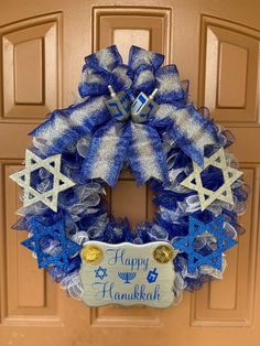 a hanukkah wreath is hanging on the front door