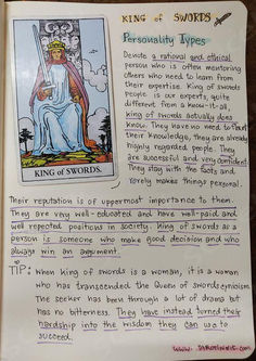 the king of swords tarot card is on display