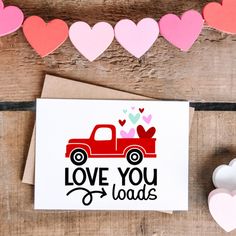 a valentine's day card with the words love you loads on it