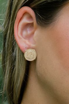 -18k Gold Plated stud earrings with four vintage Coins. -Measures .5" Length -Handmade in Brazil -18k gold plated over brass -Please note that our brand uses natural semi-precious stones-each piece has a unique texture, shine, and color. 14k Gold-filled Yellow Gold Plated Earrings, Gold Plated Clip-on Earrings, Classic Pierced Brass Jewelry, Vintage Coin-shaped Tarnish Resistant Jewelry, Vintage Tarnish-resistant Coin-shaped Jewelry, Vintage Tarnish-resistant Coin Jewelry, Tarnish Resistant Brass Plug Earrings As Gift, Vintage Coin-shaped Gold Plated Jewelry, Tarnish Resistant Gold-tone Brass Clip-on Earrings