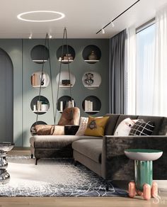 a living room filled with lots of furniture next to a large window covered in bookshelves