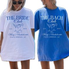 two women wearing matching t - shirts that say the bride and groom are holding hands