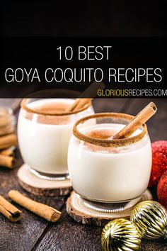 two glasses filled with homemade goya coquito on top of a wooden table