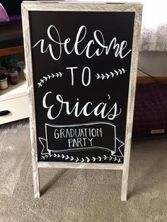 a chalkboard sign with the words welcome to circus graduation party written in cursive writing