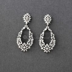 Intricately designed teardrop shaped earrings created with marquise, pear and round CZ jewels. A stunning choice for any special occasion! They are 2.25 inches long, rhodium or rose gold plated, grade AAA CZ, lead and nickel free. Infinite Money, Long Diamond Earrings, Rose Gold Bridal Earrings, Model Blouse, Silver Bridal Earrings, Diamond Mangalsutra, Diamond Necklace Designs, Bridal Earrings Drop, Jewelry Drawing