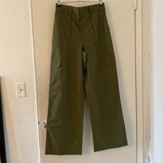 Size 6 With Stretchy Waistband Cotton On Brand Never Worn :) However There Are 2 Small Stains That I Think Will Come Off With A Wash ! Green High Waist Military Bottoms, High Waist Green Military Bottoms, Green High-waist Military Style Bottoms, Military Style Cotton Bottoms With Elastic Waistband, Military Style Green Wide Leg Bottoms, Military Style Long Pants With Relaxed Fit, High Waist Military Style Cotton Bottoms, Military Style Wide Leg Summer Bottoms, Military Style Relaxed Fit Pants For Spring