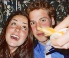 a young man and woman posing for the camera