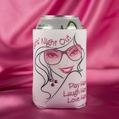 a can cooler with a woman's face painted on the side and pink background