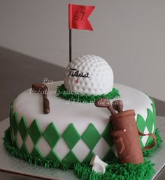 a golf themed cake with a flag on top