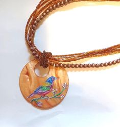 Painted Bunting Bird Necklace, Hand Painted Pendant, Handmade Jewelry, Bird Lover Gift by daniellesoriginals on Etsy Handmade Multi-strand Shell Necklace For Gift, Adjustable Multi-strand Shell Necklace As Gift, Vintage Adjustable Shell Necklace As Gift, Painted Bunting Bird, Bunting Bird, Painted Bunting, Hand Painted Pendant, Jacksonville Nc, Painted Items