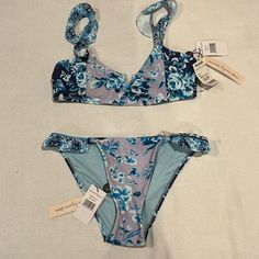 Nwt Adorable Bathing Suit Navy Lilac Light Blue White Color Rose Pattern See Pics Never Worn Light Blue Floral Print Swimwear For Spring, Purple Printed Summer Swimwear, Purple Floral Print Summer Swimwear, Purple Floral Print Swimwear, Blue Floral Print Beach Cover-up, Blue Nylon Swimwear With 4-way Stretch, Blue Lilac, Nanette Lepore, Rose Pattern