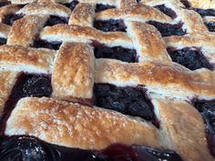 a blueberry pie with latticed crust on top