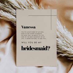 a card that says,'will you be my bridesmaid?'on it