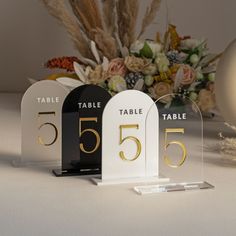 three table numbers are placed next to each other