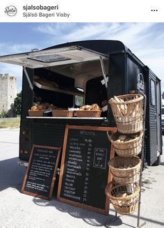 a food truck is loaded with bread and pastries