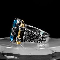 Rare Emerald Cut, Deep Blue Topaz Mens Ring, Sterling Silver 925, Handmade Blue Topaz Ring, Art Deco London Blue Topaz, Gift for Husband      ALL OUR PRODUCTS ARE HAND MADE AND CUSTOM DESIGN.    ALL OF OUR PRODUCTS ARE 925K STERLING SILVER      Item Details    ⭐ Package included: One Silver Ring – Made to order  ⭐ Sizes: From 6 to 13 US size  ⭐ Materials: 925 Sterling Silver, Bronze and Gemstone  ⭐ Gemstone: Synthetic Blue Topaz  ⭐ Gemstone Color: Blue  ⭐ Ring Color: Silver and Bronze      You c Topaz Mens Ring, Blue Ring, Ring Art Deco, Ring Color, Gift For Husband, Mens Ring, London Blue Topaz, Blue Topaz Ring, London Blue