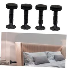 four black plastic headboards on a bed with pillows and pillow cases next to each other