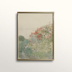 a painting hanging on the wall above a bed of wildflowers and other flowers