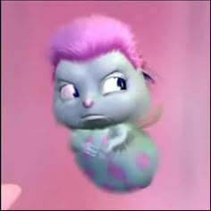 a cartoon character with pink hair and blue eyes is in the air while holding onto something