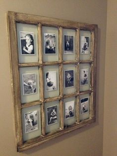 an old window frame is filled with photos and has been turned into a wall hanging