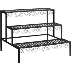 three tiered metal shelf with decorative designs on the top and bottom, black finish